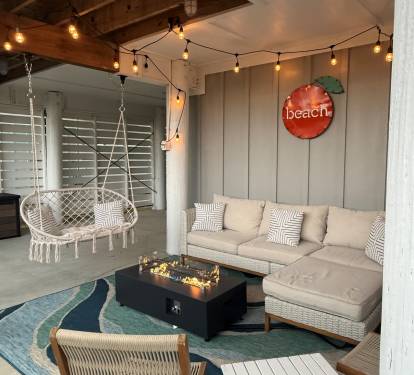 The patio area is made for relaxing with your family and friends, with a luxurious sofa with chaise lounge, a comfortable hammock swing, and a wonderful firepit for those cooler evenings.  You’ll want to spend all your time here!! 