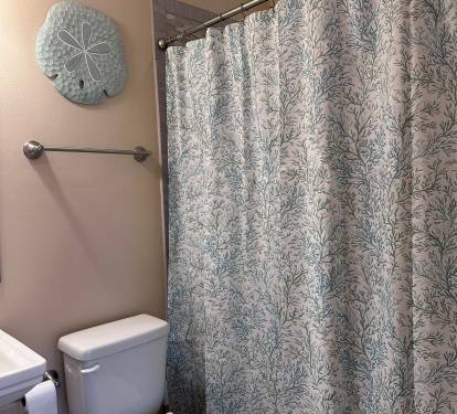 En suite bath #2 upstairs with tub/shower combo.
