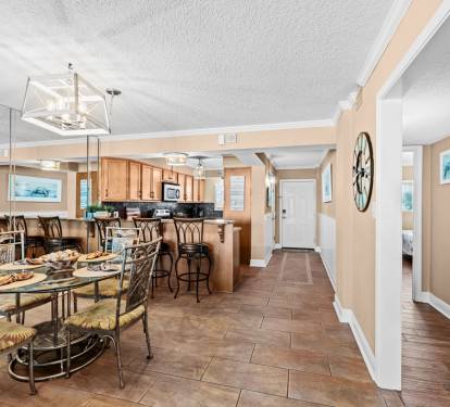 Dining area with kitchen and entryway