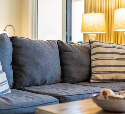 Coastal textures and cozy seating create the perfect space to relax. 