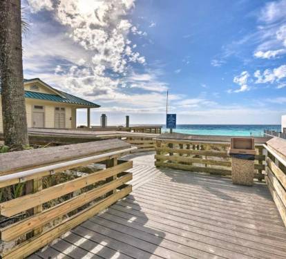 Boardwalk overlook w/ ocean views, ideal for a pause before stepping onto the sand