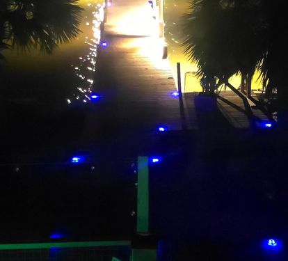 Fully lit pier for night fishing.