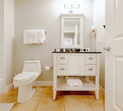 Second Master Bath features remodelled shower with niche.