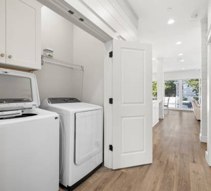 1st floor laundry closet is located in the main hallway