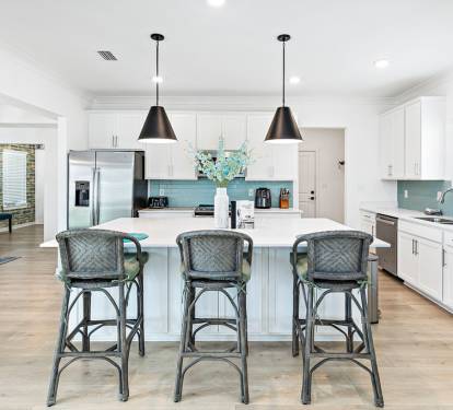 Open Kitchen Design with Large 3-Seat Island Makes It the Hub for Activities
