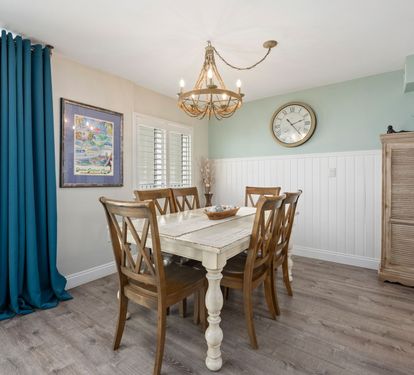 ??? "A Space for Meals and Memories. Whether you're sharing a family dinner, hosting a game night, or tackling a puzzle on a rainy day, this charming distressed wood table with seating for six