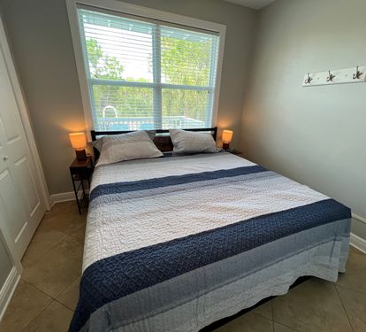 In Law Suite King Bedroom overlooking the pool and lake!