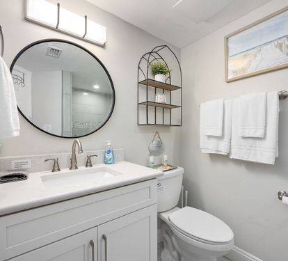 ?? "Style and Comfort Combined. The guest bath features a sleek walk-in tile shower, modern sink, and convenient seating—designed to make every moment at After Dune Delight feel luxurious." ?