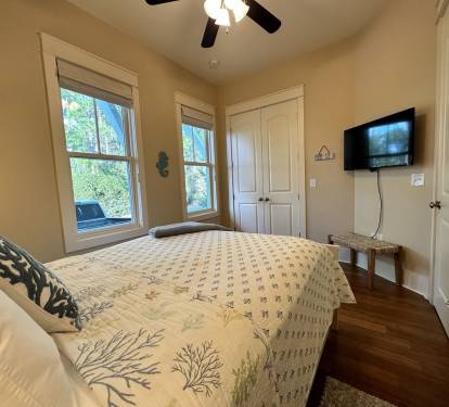 Queen Bedroom #3 downstairs with 50" Smart TV, upgraded in 2026!  