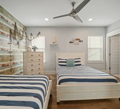 Double Queen Suite offering a bright layout and comfortable sleeping accommodations.
