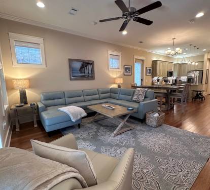 View of the Living/Dining/Kitchen from the front of the living room, looking back towards the kitchen. 