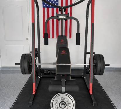 Stay active with a private gym and Marcy Smith Machine for full-body workouts.