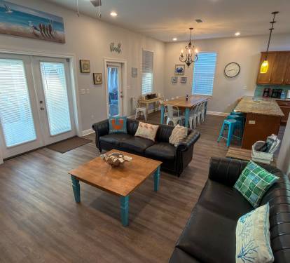 Just steps from the living room, the backyard haven creates an effortless transition between poolside afternoons and indoor relaxation. 