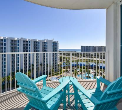 Balcony seating w/ Adirondack chairs, perfect for soaking in the open-air atmosphere.