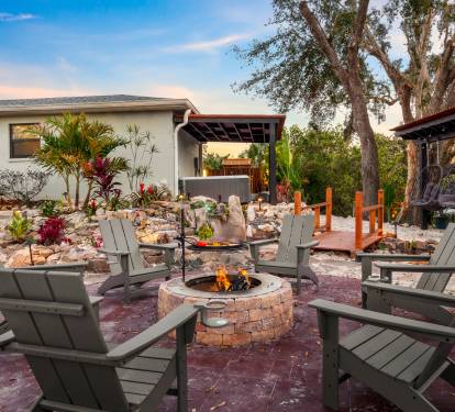 Gather 'round the warmth and light of our fire pit gathering spot. Share laughter and conversation with family and friends as the stars twinkle above, creating an unforgettable evening experience.