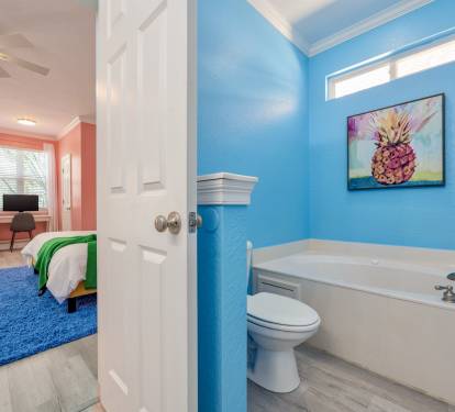 Master bath. Office workspace seen in the distance.