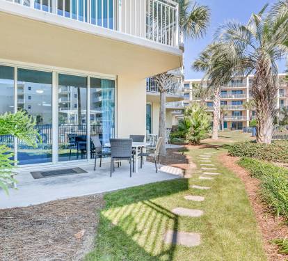 Charming walkway to common grass area for ball throwing, or any lawn games.