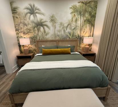 Downstairs master with jungle mural, blackout drapery