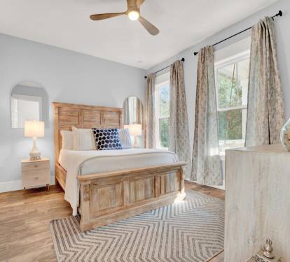 Queen bedroom with ensuite bathroom on the main level