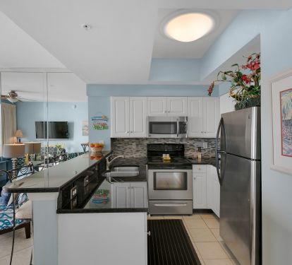 Well Supplied Galley style kitchen has all your cooking needs!