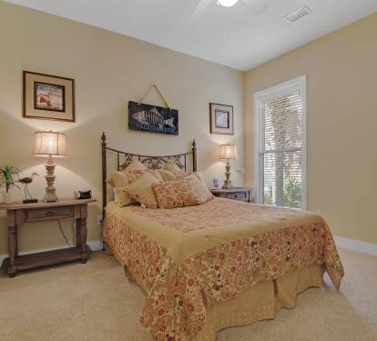 First floor bedroom has queen bed and access to first floor bath