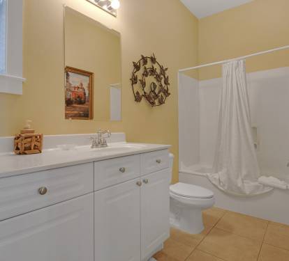First floor bath can be accessed from queen bdrm or hall