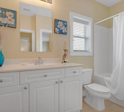 second floor guest bath can be accessed from queen bdrm or hall