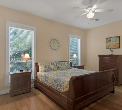 First floor second master w/ king bed, w/ access to deck and attached bath