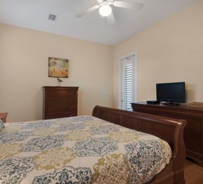 Large flat screen tv in 1st floor second master bedroom