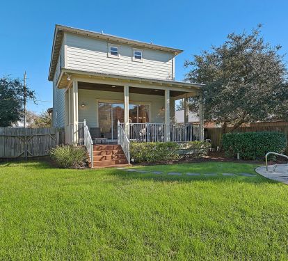 a view of the home from the back yard