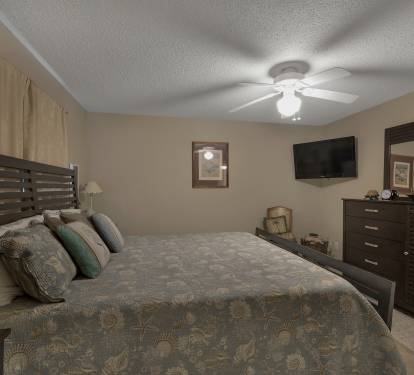 Large flat screen tv in master bedroom