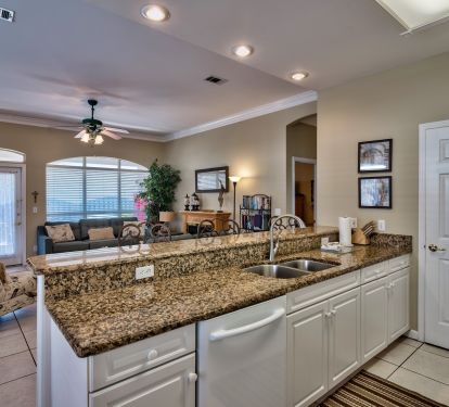 Large kitchen with eat-in counter and dining area