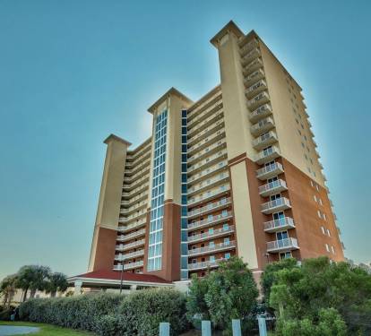 Sanibel Condo building located on the quiet end of the island of Gulf Shores and located between 2 bodies of water - the Gulf and Little Lagoon