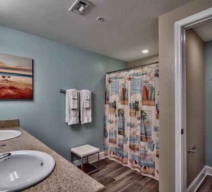 Master Suite (#2) - Private large bathroom with double granite sinks and nice tile plank flooring