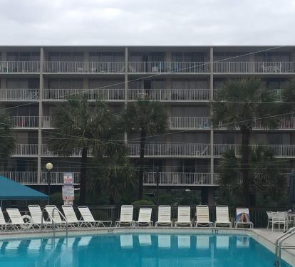 View of the building from the pool, top floor unit