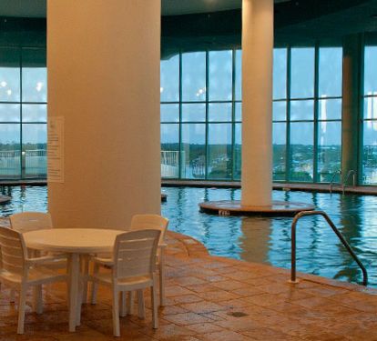 Indoor pool located next to the fitness center. Perfect for rainy days or cool winter days. Includes steam room and hot tub.