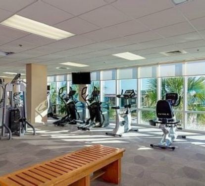 Fitness center with a sauna, free weights, weight machines, treadmills, bikes, all with a view of the gulf.  (a shower area also in the fitness center)