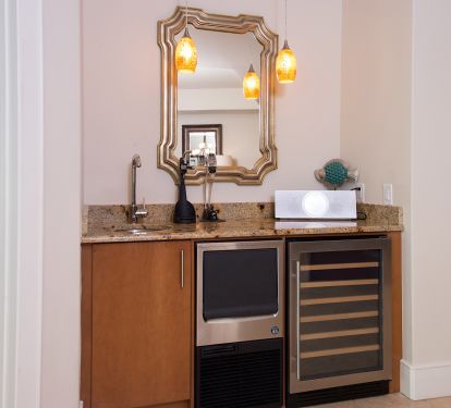 Wet bar complete with ice make and wine fridge