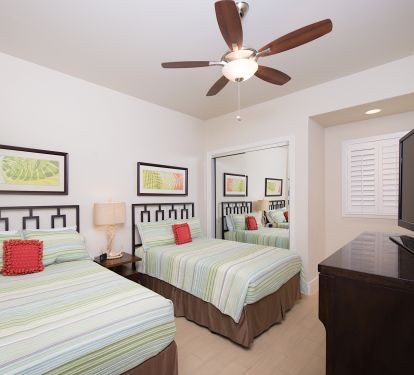 Third bedroom is equipped with 2 full size double beds, TV and private bathroom