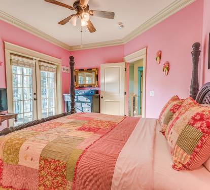 Second Floor Queen Poster Bed Room with glass french doors to upper porch, double closet, TV