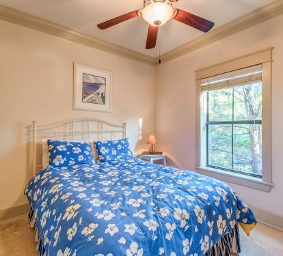 Carriage House Queen Bedroom with double closet, ceiling fan