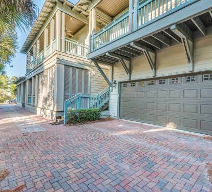 Access to Private Carriage House located above garage, large brick driveway