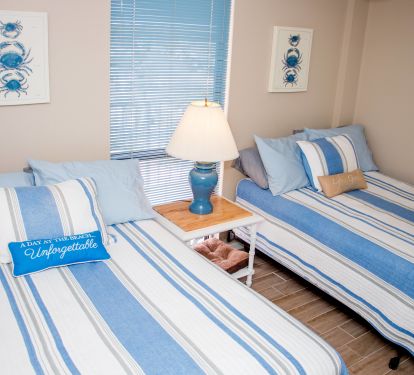 2nd Bedroom has 2 full size beds and tile floors