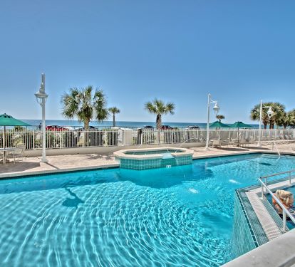 Multi level pool with waterfalls and hot tubs and fountains