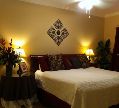 The Master features a King sized bed, with a walk in closet, and an en-suite bathroom.