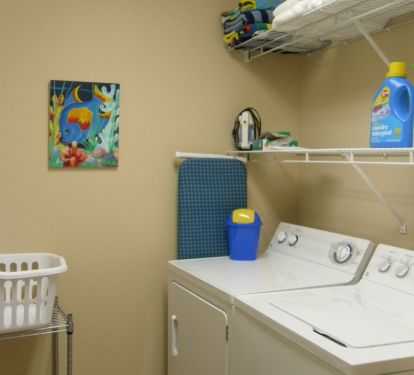 We have a full laundry room in our condo for your convenience.  It is also stocked with beach chairs and toys.