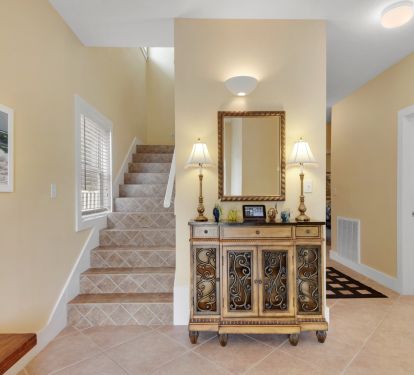 The entry , first floor has 3 bedroom, the second floor has master &amp; living area
