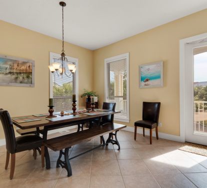 Large dining table will accommodate 8