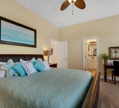 King bed in master bedroom with ensuite bath located on second floor