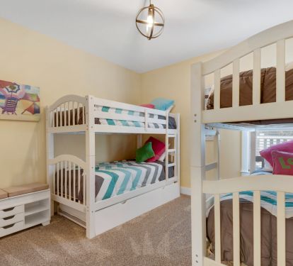 bunk room has 2 sets of twin/twin bunks and a trundle will accommodate 5